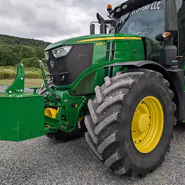 John Deer 6250 R tractor with block weight